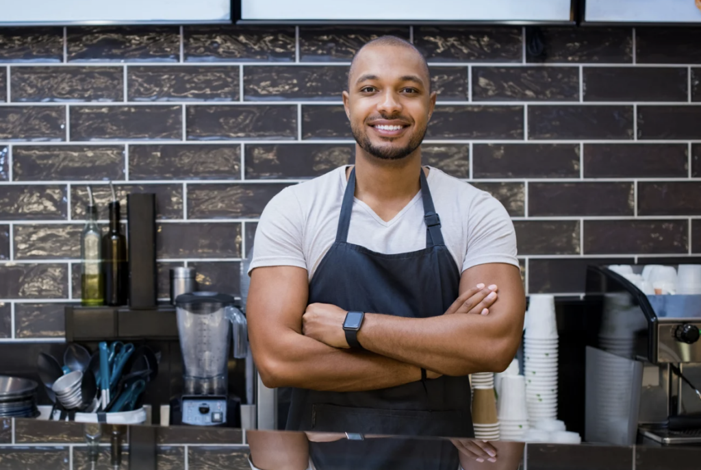 Small business owner working on AI Visibility.